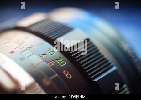Photographic lens. Vintage manual lens in blur. Stock Photo