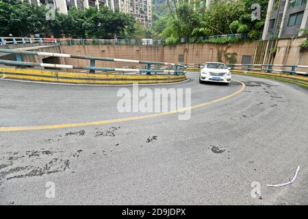 Aerial view of the 5-layer spiral road in a community in Chongqing, China, 21 October 2020. Stock Photo