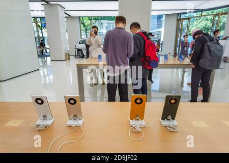 Customers queue at the flagship store of Huawei located on the east Nanjing road to book the newly released Huawei Mate 40 and experience products of Stock Photo