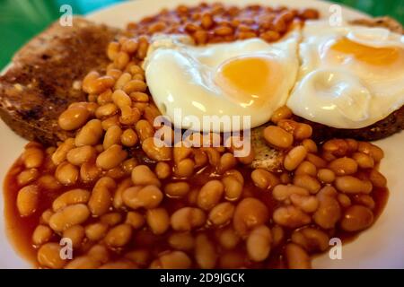 English breakfast Egg and beans on toast Stock Photo