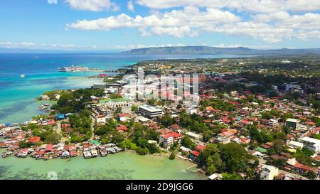 Panorama of the city of Tagbilaran against the background of the sea and mountains. View from above Bohol province,Tagbilaran city. Stock Photo