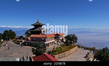 Chandragiri, Nepal - 12/02/2019: Panorama view of the peak of Chandragiri Hills with a temple complex and Kathmandu valley as well as the Himalayas. Stock Photo