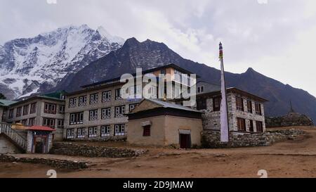 Tyangboche, Nepal - 11/25/2019: Sherpa lodge Hotel Himalayan in a stone house in village Tyangboche (Tengboche) on Everest Base Camp Trek in Himalayas. Stock Photo