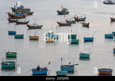 Mui ne fishemans village. Traditional Vietnamese boat in the basket shaped in Fishing village Mui Ne, Vietnam, Asia Stock Photo