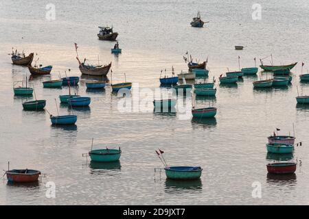 Mui ne fishemans village. Traditional Vietnamese boat in the basket shaped in Fishing village Mui Ne, Vietnam, Asia Stock Photo