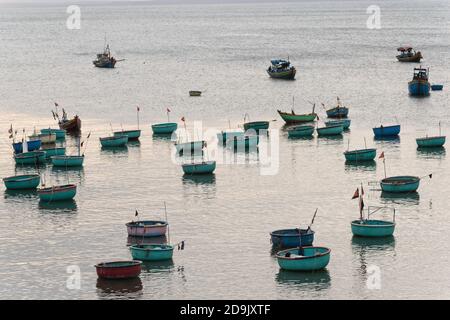 Mui ne fishemans village. Traditional Vietnamese boat in the basket shaped in Fishing village Mui Ne, Vietnam, Asia Stock Photo