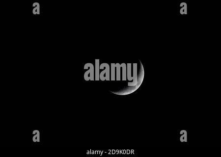 Waxing Crescent. Young moon on black background Stock Photo