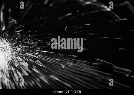 Broken glass - white lines on black background, design element. touch screen smartphone with broken screen Stock Photo