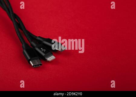 Closeup Shot of Universal USB Cable. 3 different cellphone usb charging plugs adapter from USB Stock Photo
