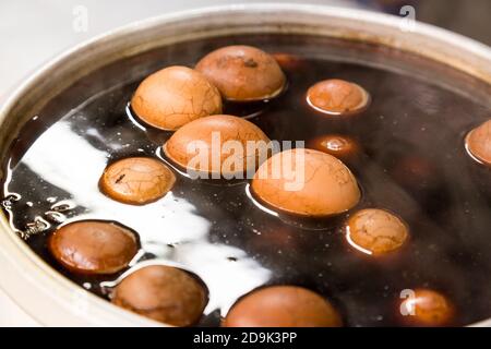 Traditional Chinese herbal tea eggs being prepared Stock Photo