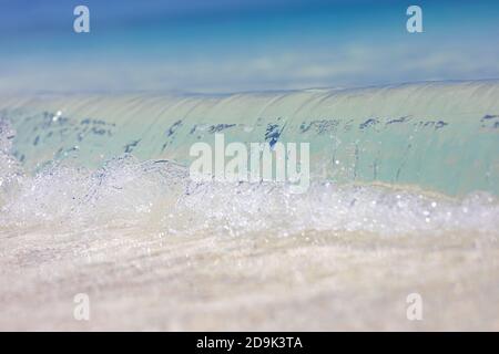 Closeup view of waves splashing sea beach sand sun daylight relaxation landscape. Waves surf, abstract sea ocean water, environment, ecology Stock Photo