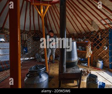 Life of the Mongolian Yurt. Interior of the nomad's house. Mongol family at home. 06.09.2019. Gobi Desert, Mongolia. Stock Photo