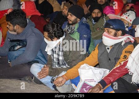 Kedarnath, Uttarakhand, India-October 31 2020: Pilgrims wearing face cover in kedarnath Dham. Kedarnath temple is a Hindu pilgrimage site in India. High quality photo Stock Photo