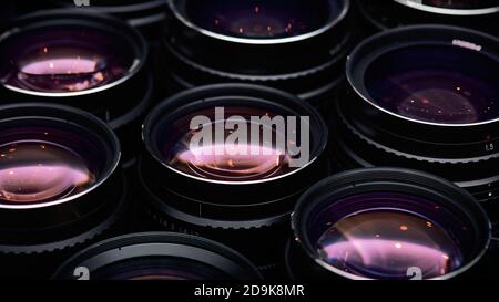High-aperture camera lenses with reflections, low key image. High-quality photographic lens close photographed. Stock Photo