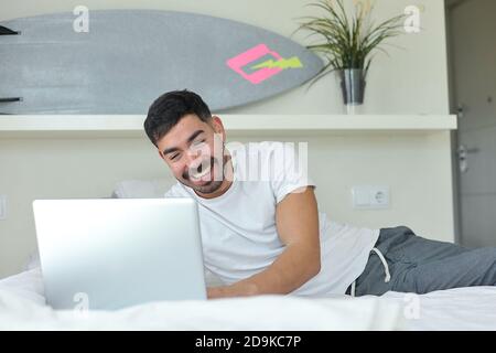 Man working from home in pajamas. Lockdown concept Stock Photo