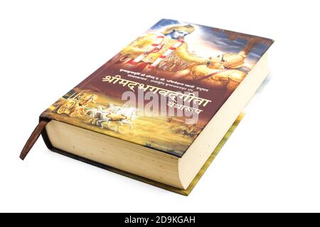 Bhagavad Gita book isolated on white background with selective focus Stock Photo