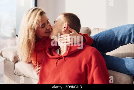 Closeness of people. Young lovely couple together at home spending weekend and holidays together Stock Photo