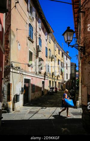 Piran, Istria, Slovenia - People in the old town streets of the port city of Piran on the Mediterranean.