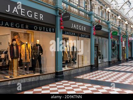 Retail shops including Jaeger in Great Western Arcade, Colmore Row, Birmingham, England, UK Stock Photo