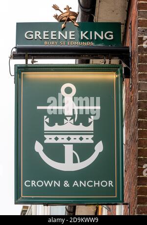 Traditional hanging pub sign at Crown and Anchor public house, Winchester, Hampshire, England, UK Stock Photo