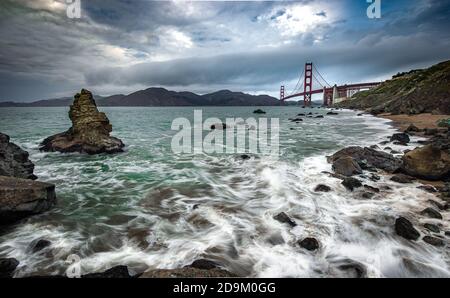 Golden Gate Bridge and Pacific Ocean in the beautiful moment Stock Photo