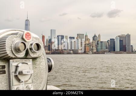Close up Photo of Coin Operated Binoculars with View in Manhattan Cityscape, New York City, USA Stock Photo
