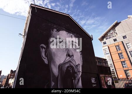Ian Curtis of Joy Division mural in Manchester's Northern Quarter by artist Akse p19. Stock Photo