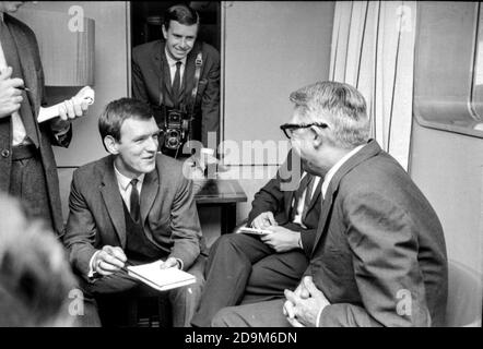 Hollywood couple Cary Grant and Dyan Cannon meet reporters at Southampton Airport in 1966 as the couple arrive in England to visit Grant's mother. Stock Photo