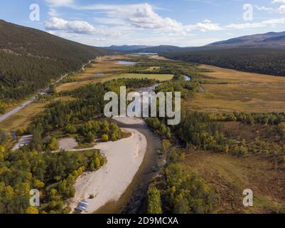 Aerial view of a river bed winding through the Norwegian landscape Stock Photo