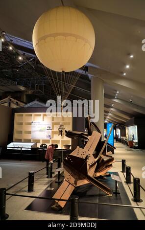 A bent iron frame of Asakusa International Theater destroyed during Bombing of Tokyo during WWII with a barrage balloon in the background.Edo-Tokyo Museum.Tokyo.Japan Stock Photo