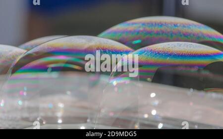 Bubble soap is beautiful. Air bubbles in water with a dark background. Abstract oxygen bubbles. Stock Photo