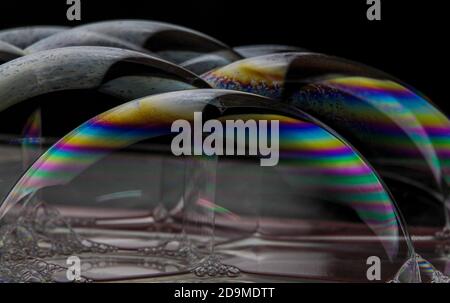 Bubble soap is beautiful. Air bubbles in water with a dark background. Abstract oxygen bubbles. Stock Photo