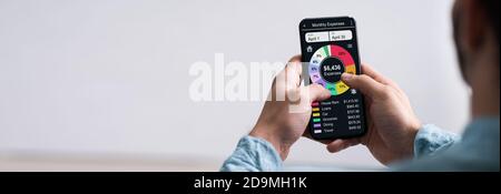 Budget Money Tracker App On Mobile Phone Stock Photo