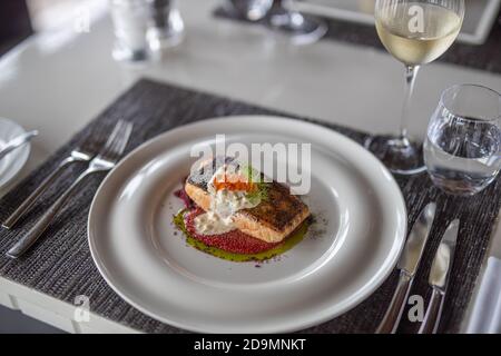 Table served in the restaurant. Luxury table setting, gourmet food background. Dining in elegant, top quality restaurant, modern table Stock Photo