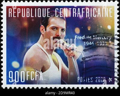 Freddie Mercury during a concert on stamp Stock Photo