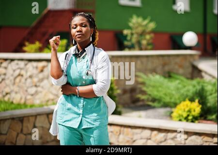 Portrait of African American female doctor with stethoscope wearing lab coat. Stock Photo