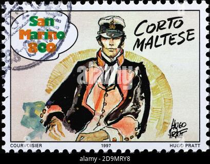 Italian cartoon Corto Maltese on postage stamp Stock Photo