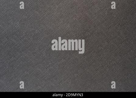 grey background from a textile material with wicker pattern, closeup. Stock Photo