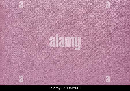 purple background from a textile material with wicker pattern, closeup. Stock Photo