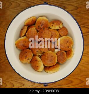 Pogacsa – Biscuits with bacon in a large white bowl Stock Photo