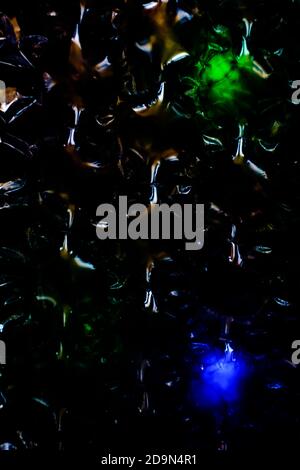 abstract background created with a colorful image through a sheet of plastic bubble wrap Stock Photo