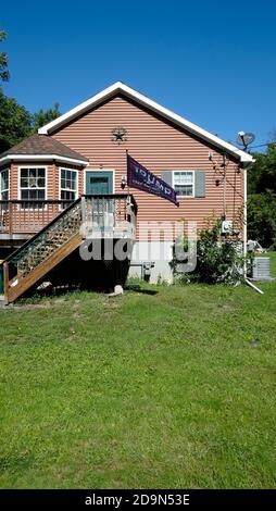 Brick house in Saugerties NY with Trump 2020 banner Stock Photo