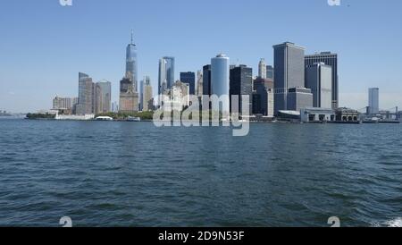 Wall Street office towers with One World Trade Center, designed by David Childs from Skidmiore, Owings & Merril photographed from Staten Island Ferry