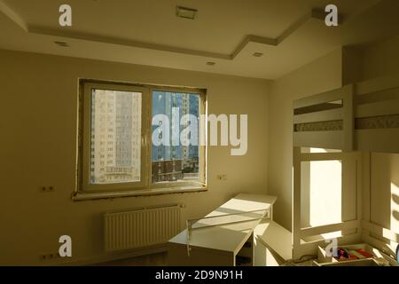 Process installation slopes of window. Using a moanting foam. Stock Photo