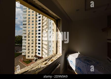 Process installation slopes of window. Using a moanting foam. Stock Photo