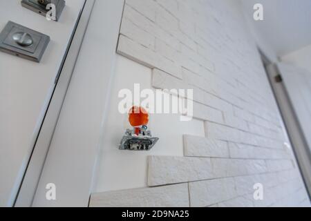 Electrical outlet during installation in office wall Stock Photo