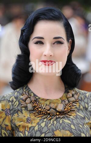 Dita Von Teese attends the Burberry Prorsum Spring/Summer 2013 Womenswear Fashion Show, Kensington Gardens, London. 17th September 2012© Paul Treadway Stock Photo