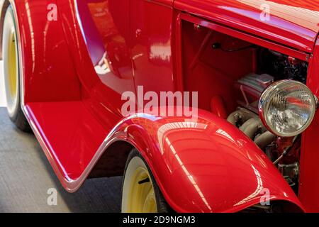 MACKAY, QUEENSLAND, AUSTRALIA - 13th July 2019: Close up of hot rod engine, mudguard and running board custom classic vintage car Stock Photo