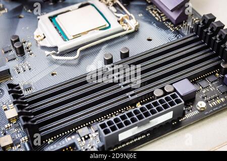 Closeup on empty RAM or random access memory slot on modern black motherboard Stock Photo