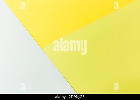 Pastel papers color background is nested backdrop flat lay. green, pink, yellow Stock Photo